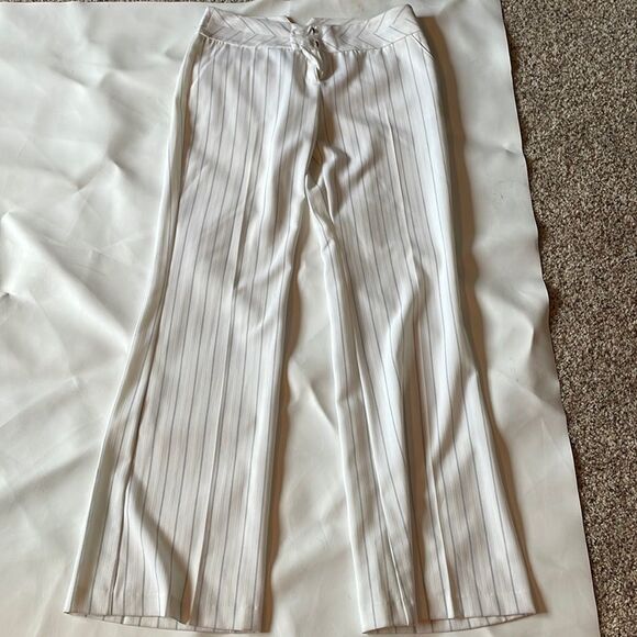 BCX Pants - BCX woman’s white trousers with black pinstripes down the pants.